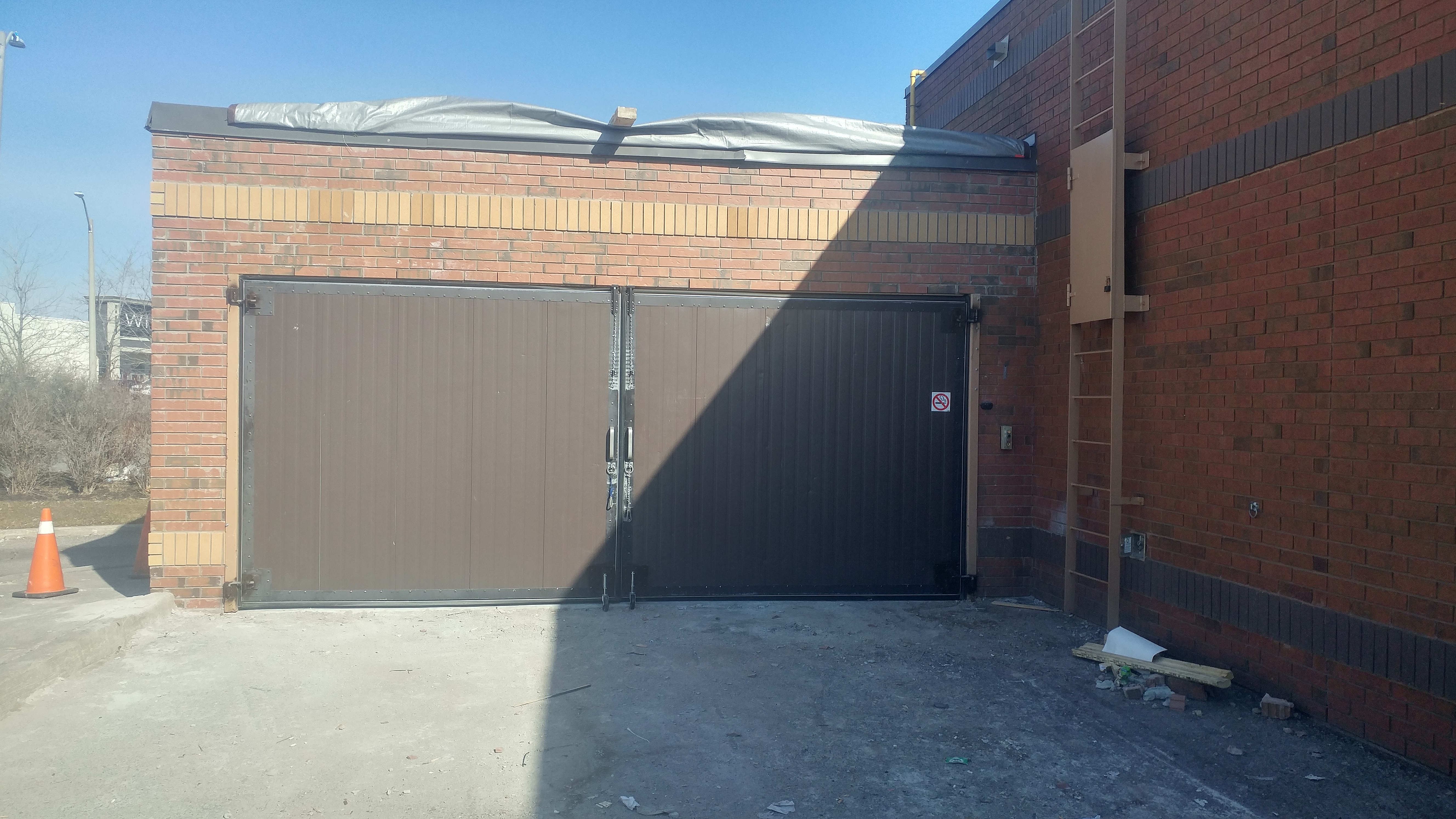 Retro-Fit Barn Doors For Commercial Garbage Bin Storage